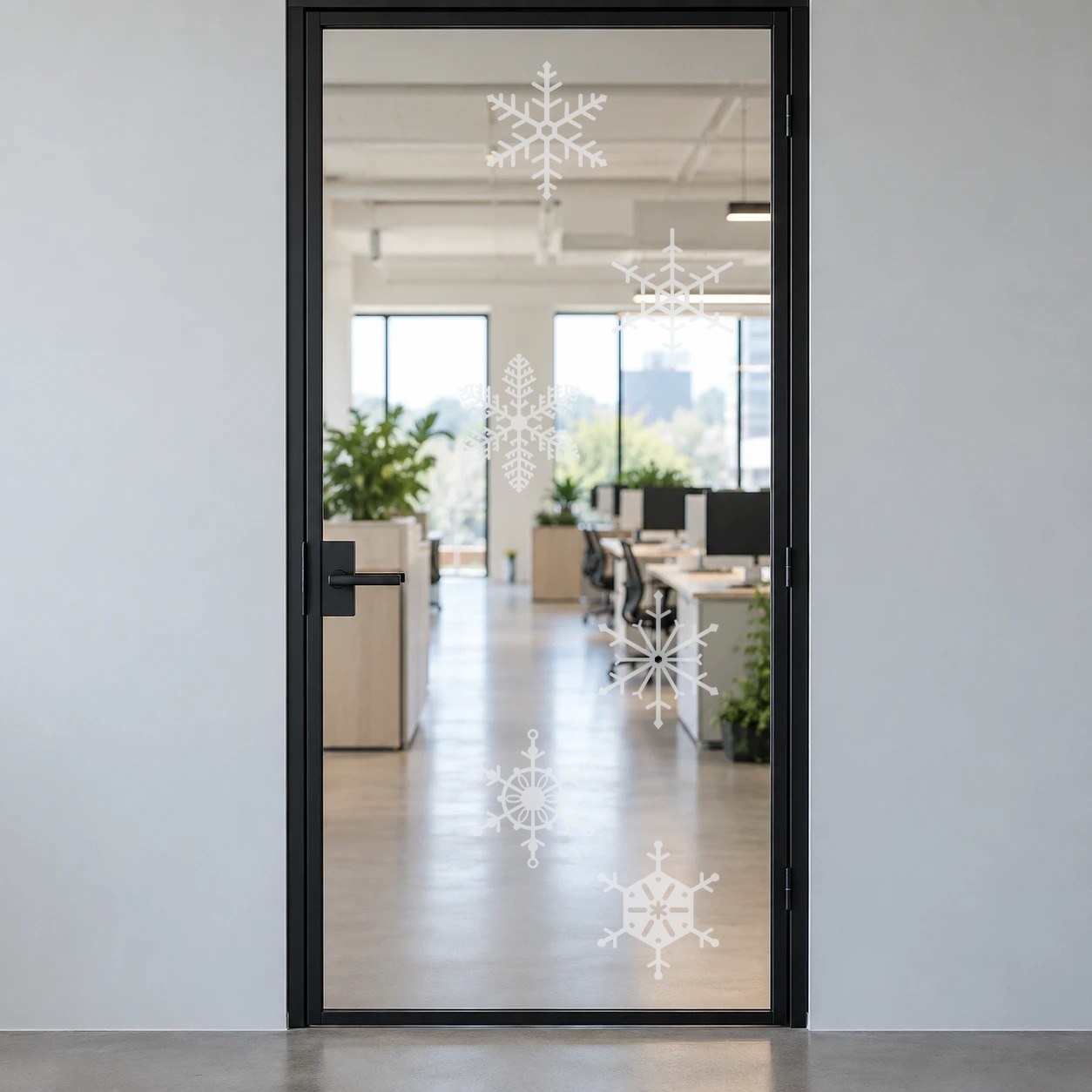 Set of six 10 inch frosted snowflakes on a glass office door (product photo 2 of 6)